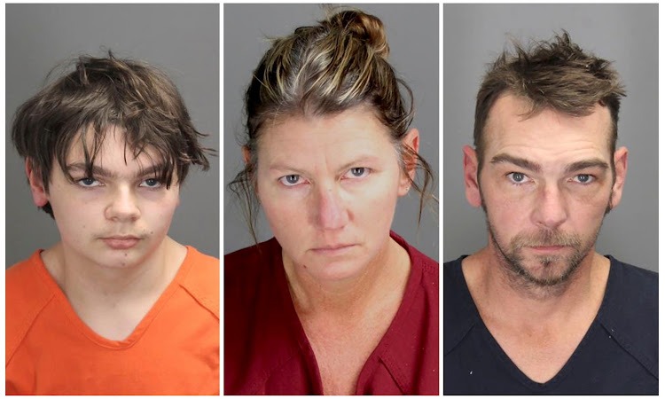 Ethan Robert Crumbley, 15, charged with first-degree murder in a high school shooting, poses in a jail booking photograph taken at the Oakland County Jail in Pontiac, Michigan, U.S. December 1, 2021, in a combination photograph with his parents Jennifer Lynn Crumbley and James Robert Crumbley who were taken into custody December 3, 2021.  Oakland County Sheriff's Office/Handout via REUTERSTHIS IMAGE HAS BEEN SUPPLIED BY A THIRD PARTY. THIS PICTURE WAS PROCESSED BY REUTERS TO ENHANCE QUALITY. AN UNPROCESSED VERSION HAS BEEN PROVIDED SEPARATELY 